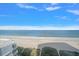 Panoramic beach view of the ocean from a condo balcony on a sunny day at 1340 Gulf Blvd # 12A, Clearwater Beach, FL 33767