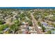 Aerial view of the house and neighborhood; the home is conveniently located near the bay at 1406 Nebraska Ave, Palm Harbor, FL 34683