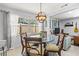 Charming dining room offering natural light, modern decor, and an inviting atmosphere for Gathering gatherings and entertaining at 1406 Nebraska Ave, Palm Harbor, FL 34683