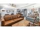 Spacious living area seamlessly connecting to kitchen and dining area, offering versatile living and entertaining at 1406 Nebraska Ave, Palm Harbor, FL 34683