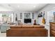 Cozy living room featuring modern decor, comfortable seating, and ample natural light for a welcoming atmosphere at 1406 Nebraska Ave, Palm Harbor, FL 34683