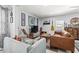 Relaxing living room with stylish decor, comfortable seating, and natural light, perfect for unwinding and entertaining at 1406 Nebraska Ave, Palm Harbor, FL 34683
