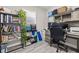 Organized home office with built-in shelves, ample storage, and a comfortable workspace at 1406 Nebraska Ave, Palm Harbor, FL 34683