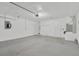 Spacious and clean garage with concrete flooring and ample storage potential at 1604 Dusty Rose Ln, Brandon, FL 33510
