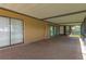 Cozy screened-in patio offering a relaxing outdoor space and shade at 1604 Dusty Rose Ln, Brandon, FL 33510