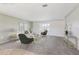 Staged living room with comfortable seating and stylish decor, perfect for relaxation and entertaining at 1717 Danbury Dr, Sun City Center, FL 33573