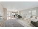 Staged open-concept living area with a dining space, perfect for Gathering gatherings at 1717 Danbury Dr, Sun City Center, FL 33573