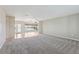 Open-concept living space with seamless flow to the dining area, ideal for modern living at 1717 Danbury Dr, Sun City Center, FL 33573