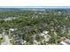 An aerial view of a residential community featuring trees and lush landscaping with a neighborhood setting at 1826 2Nd E Ave, Bradenton, FL 34208