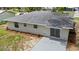 A great aerial view showing a home's roof, yard, and patio at 1826 2Nd E Ave, Bradenton, FL 34208