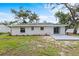 The backyard with a concrete patio area perfect for outdoor entertaining at 1826 2Nd E Ave, Bradenton, FL 34208