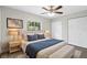 Cozy bedroom with natural light, ceiling fan, large closets, and neutral decor at 1826 2Nd E Ave, Bradenton, FL 34208