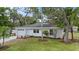 Charming single-story home with fresh paint, landscaped yard, and attached garage at 1826 2Nd E Ave, Bradenton, FL 34208