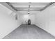 Spacious two-car garage with ample storage space and a convenient utility sink at 1826 2Nd E Ave, Bradenton, FL 34208