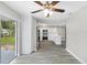 Spacious kitchen with stainless appliances, white cabinets and a seamless indoor/outdoor flow at 1826 2Nd E Ave, Bradenton, FL 34208