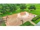 Aerial image displays a modern basketball court in a well-maintained recreational area with lush greenery at 18339 Fish Loop, Land O Lakes, FL 34638