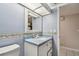 Bathroom with bright countertop, adding a touch of style, and fixtures for convenience at 1972 Lansing Dr, Clearwater, FL 33763