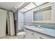 Bathroom with bright countertop, adding a touch of style, and fixtures for convenience at 1972 Lansing Dr, Clearwater, FL 33763