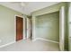Bedroom featuring a closet, a window and ceiling fan, providing comfort and ample storage space at 1972 Lansing Dr, Clearwater, FL 33763