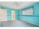 Spacious bedroom featuring windows, and unique painted walls creating a cozy retreat at 1972 Lansing Dr, Clearwater, FL 33763