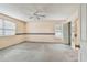 Spacious bedroom featuring a ceiling fan, neutral walls, and carpet flooring at 1972 Lansing Dr, Clearwater, FL 33763