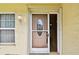 Close up of the front door featuring decorative glass and screen at 1972 Lansing Dr, Clearwater, FL 33763