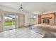 View of an empty living room leading to an outdoor patio at 1972 Lansing Dr, Clearwater, FL 33763