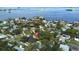 Aerial shot of property with pool, Dunedin Causeway and Honeymoon Island in the background at 201 South St, Palm Harbor, FL 34683