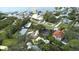 Aerial view of a community near a marina, showing a property with a pool at 201 South St, Palm Harbor, FL 34683