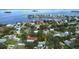 Aerial view showing property with pool near Honeymoon Island in the distance at 201 South St, Palm Harbor, FL 34683
