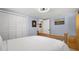 Bright bedroom with hardwood floors, neutral walls, and ample closet space at 201 South St, Palm Harbor, FL 34683