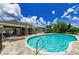 Inviting community pool with lounge chairs, manicured landscaping, and a serene place to unwind at 2119 Broadway View Ave, Brandon, FL 33510