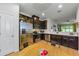 Well-designed kitchen with stainless steel appliances overlooking a charming dining nook at 2119 Broadway View Ave, Brandon, FL 33510