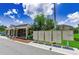 View of the community mailboxes with a recreation center in the background on a sunny day with bright blue skies and fluffy clouds at 2119 Broadway View Ave, Brandon, FL 33510