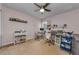 Dedicated home office space bathed in pink hues and designed for maximum productivity at 2119 Broadway View Ave, Brandon, FL 33510