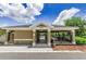 Pool clubhouse with a covered seating area and restrooms for a great residential experience at 2119 Broadway View Ave, Brandon, FL 33510