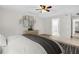 Well-designed bedroom with modern accents, artwork, and access to ensuite bathroom at 2222 Norwegian Dr # 16, Clearwater, FL 33763