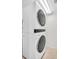 Conveniently stacked, modern washer and dryer maximize space in the laundry area at 2222 Norwegian Dr # 16, Clearwater, FL 33763