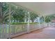 Relaxing covered patio provides a tranquil outdoor space with views of landscaped grounds at 2222 Norwegian Dr # 16, Clearwater, FL 33763