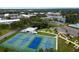 Enjoy the tennis courts surrounded by green spaces, a gazebo, and park benches in this inviting community at 2222 Norwegian Dr # 16, Clearwater, FL 33763