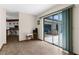 Bright living room featuring tile flooring, and sliding glass doors to outdoor patio at 2319 Canfield Dr, Spring Hill, FL 34609