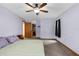 Spacious bedroom with carpet, ceiling fan, and neutral wall color at 2319 Canfield Dr, Spring Hill, FL 34609