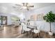 Cozy dining area featuring modern table, seating, and hardwood-style flooring at 2353 Eastwood Dr, Clearwater, FL 33765