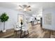 Cozy dining area near the kitchen with table, seating, and hardwood-style flooring at 2353 Eastwood Dr, Clearwater, FL 33765