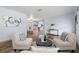 Bright and airy living room featuring modern furniture and an open floor plan at 2353 Eastwood Dr, Clearwater, FL 33765