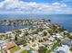 Breathtaking aerial view of waterfront community featuring serene waters and beautiful residences at 2502 Tropical Shores Se Dr, St Petersburg, FL 33705