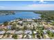 Expansive aerial view of a residential area with waterfront access and mature trees at 2502 Tropical Shores Se Dr, St Petersburg, FL 33705