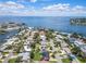 Beautiful aerial view of waterfront community with stunning ocean views and lush green landscaping at 2502 Tropical Shores Se Dr, St Petersburg, FL 33705