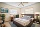 Nicely staged bedroom with a large bed, desk, and modern decor at 2502 Tropical Shores Se Dr, St Petersburg, FL 33705