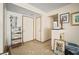 Foyer features an entryway, artwork, shelving, and other various decor at 2502 Tropical Shores Se Dr, St Petersburg, FL 33705